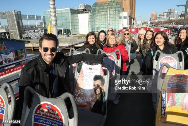Singer and actor James Maslow unveils his Ride Of Fame IT Bus at Pier 78 on December 6, 2017 in New York City.