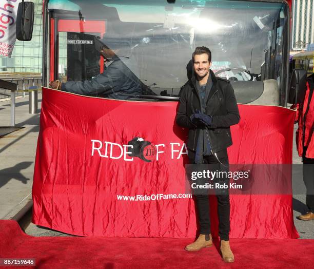 Singer and actor James Maslow unveils his Ride Of Fame IT Bus at Pier 78 on December 6, 2017 in New York City.