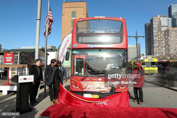 Singer and actor James Maslow and David W. Chien unveil James Maslow's Ride Of Fame IT Bus at Pier 78 on December 6, 2017 in New York City.