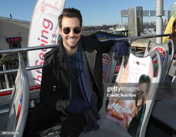 Singer and actor James Maslow unveils his Ride Of Fame IT Bus at Pier 78 on December 6, 2017 in New York City.