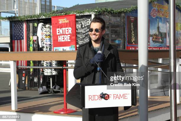 Singer and actor James Maslow unveils his Ride Of Fame IT Bus at Pier 78 on December 6, 2017 in New York City.