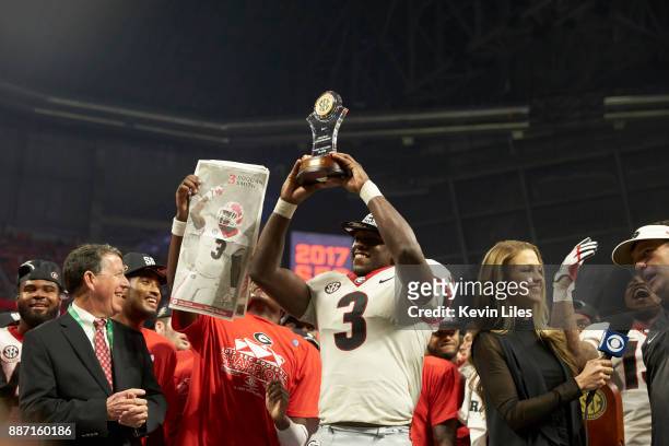 Championship: Georgia Roquan Smith victorious, holding up MVP trophy after winning game vs Auburn at Mercedes-Benz Stadium. Atlanta, GA 12/2/2017...