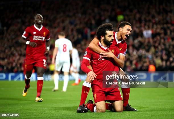 Mohamed Salah of Liverpool celebrates after scoring his sides seventh goal with Trent Alex Arnold of Liverpool during the UEFA Champions League group...