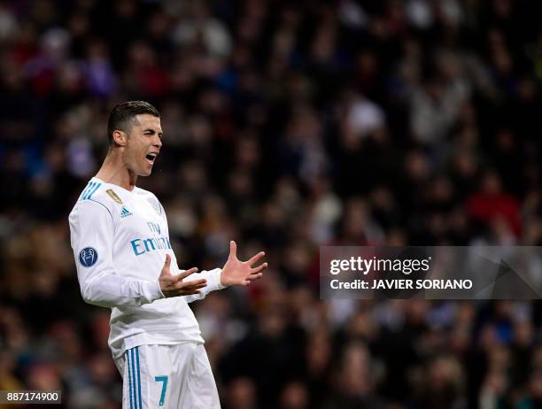 Real Madrid's Portuguese forward Cristiano Ronaldo reacts to missing a goal during the UEFA Champions League group H football match Real Madrid CF vs...