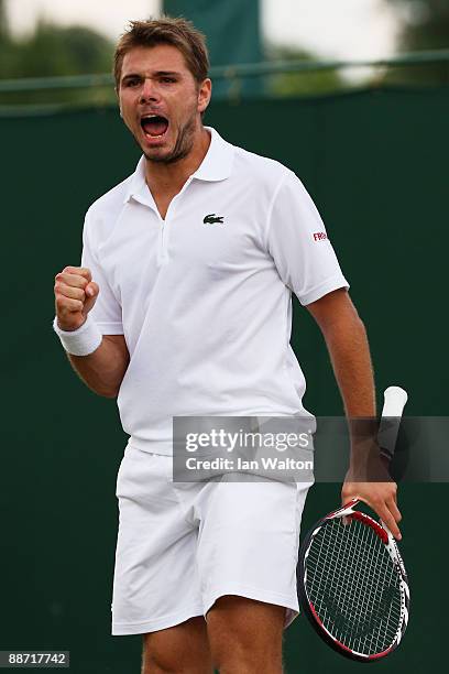 Stanislas Wawrinka of Switzerland celebrates during the men's singles third round match against Jesse Levine of USA on Day Six of the Wimbledon Lawn...