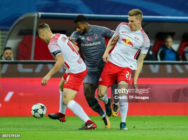 Willi Orban of Leipzig, Marcel Halstenberg of Leipzig and Jeremain Lens of Besiktas battle for the ball during the UEFA Champions League group G...