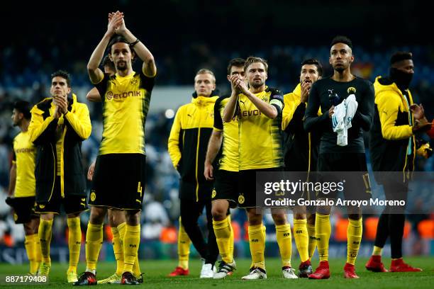 Neven Subotic, Marcel Schmelzer and Pierre-Emerick Aubameyang of Borussia Dortmund clap the fans after the UEFA Champions League group H match...