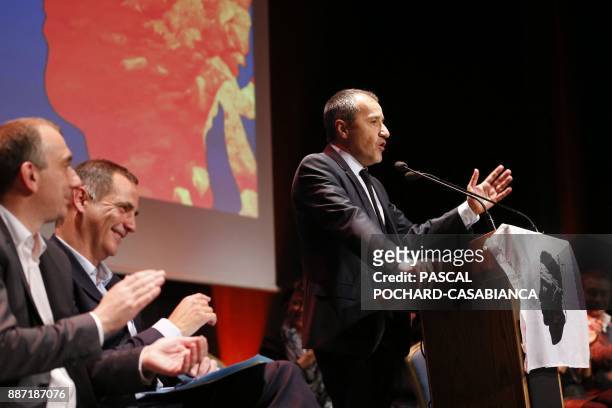 Candidates for the Pe a Corsica nationalist party for Corsican regional elections Jean-Christophe Angelini and Gilles Simeoni applaud as candidate...