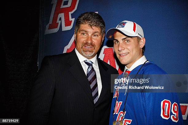 Ray Bourque poses with his sons Ryan Bourque after he was drafted by the New York Rangers during the 2009 NHL Entry Draft at the Bell Centre on June...