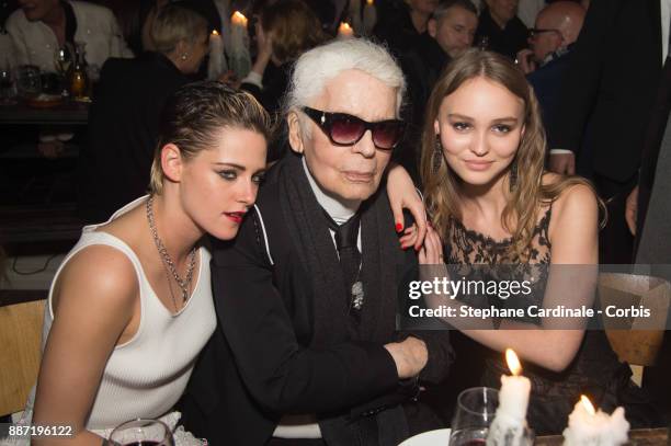 Kristen Stewart, Karl Lagerfeld and Lily Rose Depp attend the Chanel - Collection Metiers d'Art Paris Hamburg 2017/18 : Party on December 6, 2017 in...