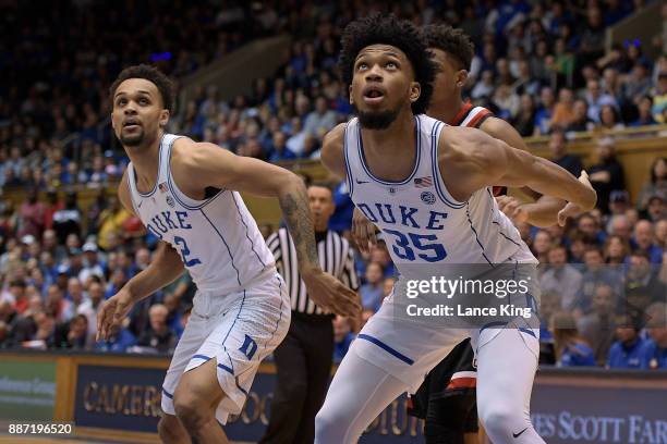 Gary Trent, Jr. #2 and Marvin Bagley III of the Duke Blue Devils in action against the St. Francis Red Flash at Cameron Indoor Stadium on December 5,...