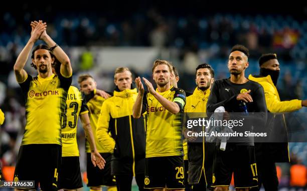 Neven Subotic, Marcel Schmelzer and Pierre-Emerick Aubameyang of Borussia Dortmund after the final whistle during the UEFA Champions League match...