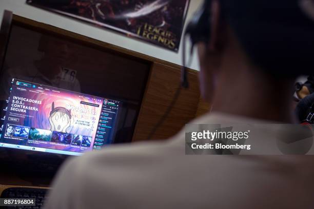 Person plays a video game on a computer at a cybercafe in Caracas, Venezuela, on Tuesday, Nov. 28, 2017. Crisis-wracked Venezuela has become fertile...