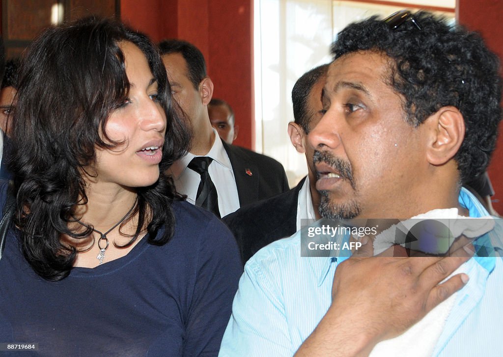 Algerian Rai singer Cheb Khaled and his wife Samira are welcomed by