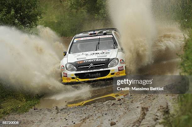 Petter Solberg of Norway and Phill Mills of Great Britain compete in their Citroen Xsara during the Leg 2 of WRC Rally of Poland on June 27, 2009 in...