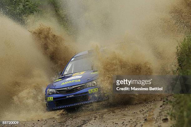 Mads Ostberg of Norway and Jonas Andersson of Sweden compete in their Subaru Impreza during the Leg 2 of the WRC Rally of Poland on June 27, 2009 in...