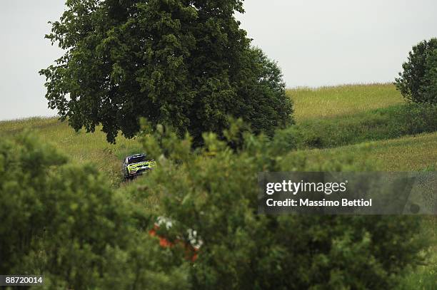 Jari Matti Latvala of Finland and Mikka Anttila of Finland compete in their BP Abu Dhabi Ford Focus during the Leg 2 of WRC Rally of Poland on June...