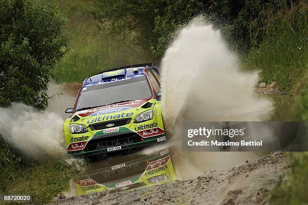 Jari Matti Latvala of Finland and Mikka Anttila of Finland compete in their BP Abu Dhabi Ford Focus during the Leg 2 of WRC Rally of Poland on June...