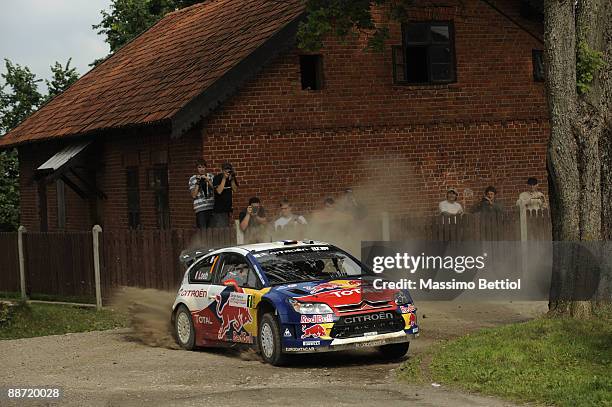Sebastien Loeb of France and Daniel Elena of Monaco compete in their Citroen C 4 Total during the Leg 2 of the WRC Rally of Poland on June 27, 2009...