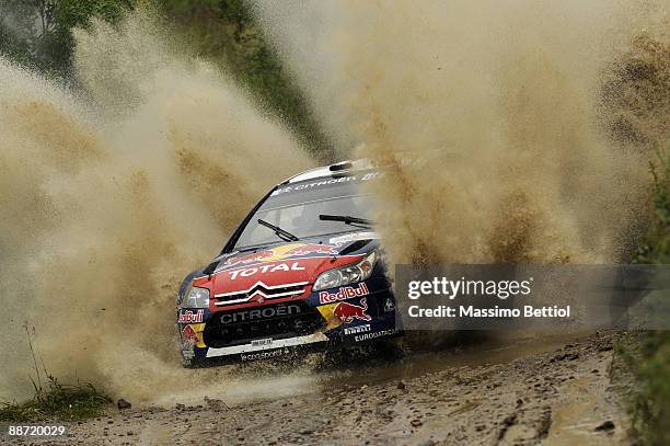 Sebastien Loeb of France and Daniel Elena of Monaco compete in their Citroen C 4 Total during the Leg 2 of the WRC Rally of Poland on June 27, 2009...