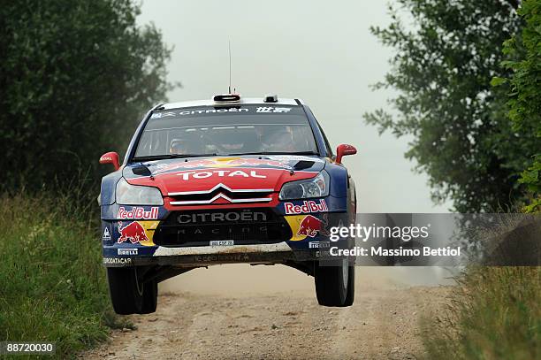 Sebastien Loeb of France and Daniel Elena of Monaco compete in their Citroen C 4 Total during the Leg 2 of the WRC Rally of Poland on June 27, 2009...