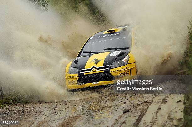 Evgeny Novikov of Russia and Dale Moscatt of Australia compete in their Citroen C 4 Junior Team during the Leg 2 of the WRC Rally of Poland on June...