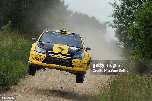 Evgeny Novikov of Russia and Dale Moscatt of Australia compete in their Citroen C 4 Junior Team during the Leg 2 of the WRC Rally of Poland on June...
