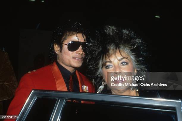 Entertainers Michael Jackson and Elizabeth Taylor attend the LA Bullet Opening Night party in May 1986 in Los Angeles, California.