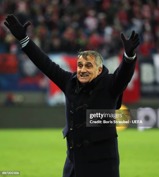 Head coach Senol Guenes of Besiktas Istanbul celebrates during the UEFA Champions League group G match between RB Leipzig and Besiktas at Red Bull...