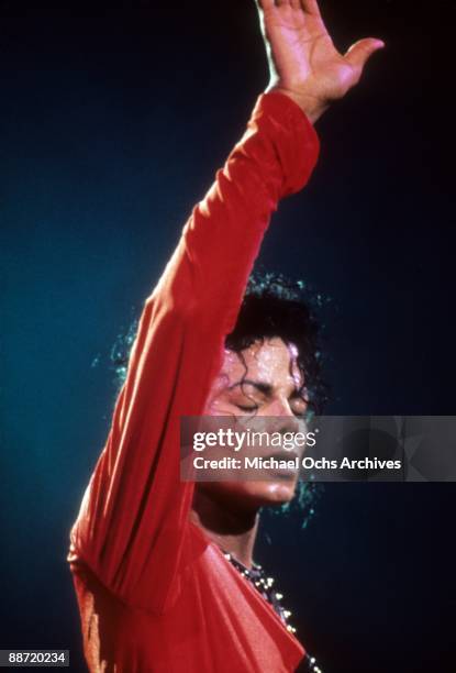 Pop Star Michael Jackson performs onstage in 1987 in Tokyo, Japan.