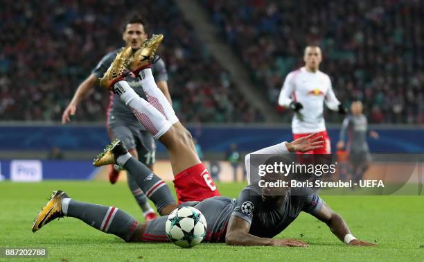 Jeremain Lens of Besiktas Istanbul is tackled by Bernardo of RB Leipzig during the UEFA Champions League group G match between RB Leipzig and...