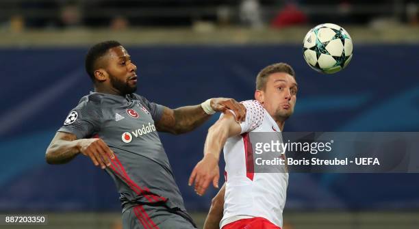 Stefan Ilsanker of RB Leipzig battles for the ball with Jeremain Lens of Besiktas Istanbul during the UEFA Champions League group G match between RB...