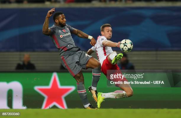 Stefan Ilsanker of RB Leipzig battles for the ball with Jeremain Lens of Besiktas Istanbul during the UEFA Champions League group G match between RB...