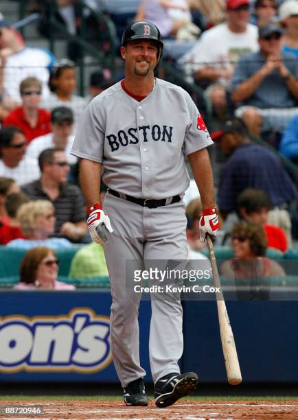 Starting pitcher Tim Wakefield of the Boston Red Sox reacts after taking a strike against the Atlanta Braves at Turner Field on June 27, 2009 in...