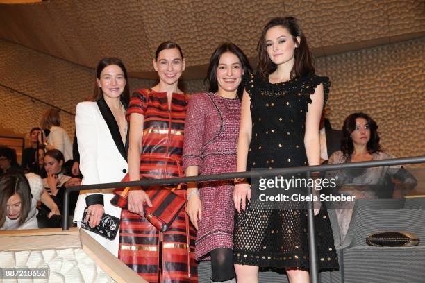 Hannah Herzsprung, Christiane Paul, Nicolette Krebitz and Lea van Acken during the Chanel "Trombinoscope" Collection des Metiers d'Art 2017/18 photo...