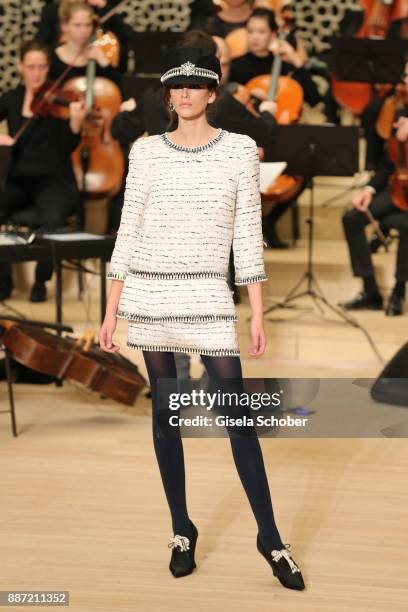 Model Kaia Gerber, daughter of Cindy Crawford during the Chanel "Trombinoscope" collection Metiers d'Art 2017/18 show at Elbphilharmonie on December...