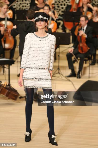 Model Kaia Gerber, daughter of Cindy Crawford during the Chanel "Trombinoscope" collection Metiers d'Art 2017/18 show at Elbphilharmonie on December...