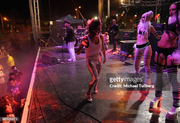 Musicians Gregori Chad Petree and Sisely Treasure of Shiny Toy Guns performing onstage at the 13th annual Electric Daisy Carnival electronic music...