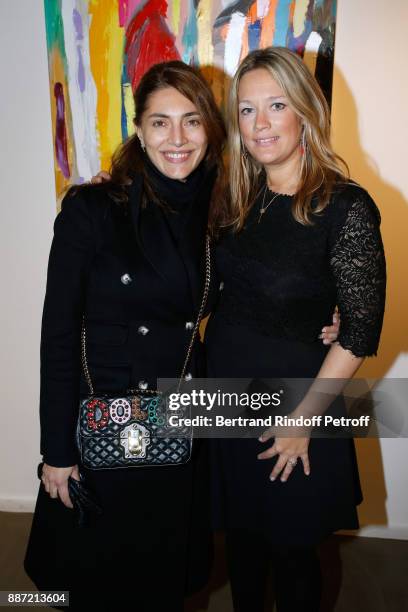 Caterina Murino and Caroline Faindt attend painter Caroline Faindt Exhibition Opening at "L'Espace Reduit" on December 6, 2017 in Paris, France.