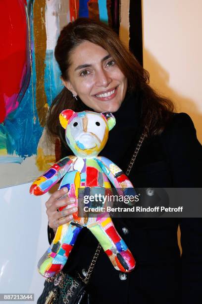 Actress Caterina Murino attends painter Caroline Faindt Exhibition Opening at "L'Espace Reduit" on December 6, 2017 in Paris, France.