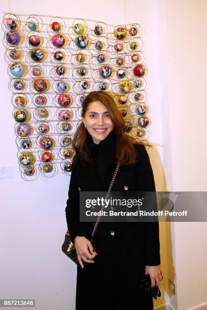 Actress Caterina Murino attends painter Caroline Faindt Exhibition Opening at "L'Espace Reduit" on December 6, 2017 in Paris, France.