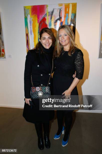 Caterina Murino and Caroline Faindt attend painter Caroline Faindt Exhibition Opening at "L'Espace Reduit" on December 6, 2017 in Paris, France.