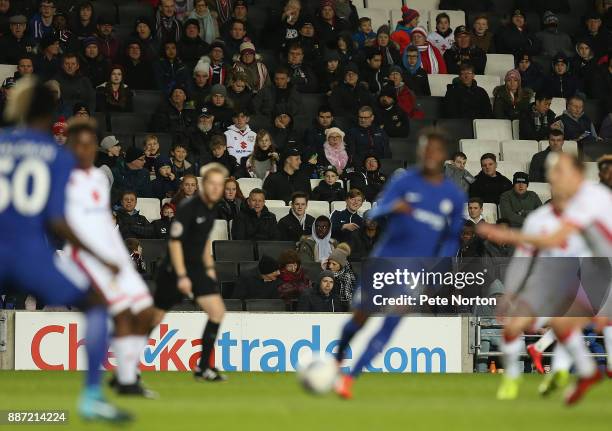 Section of the 1549 fans who attended the game look on during the Checkatrade Trophy Second Round match between Milton Keynes Dons and Chelsea U21vat...