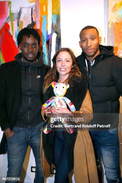 Actors Archibald Schmidt, Dounia Coesens and Dorel Hope attend painter Caroline Faindt Exhibition Opening at "L'Espace Reduit" on December 6, 2017 in...