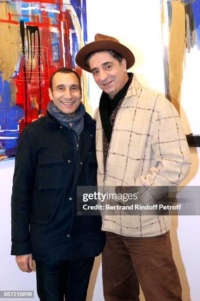 Actors Zinedine Soualem and Simon Abkarian attend painter Caroline Faindt Exhibition Opening at "L'Espace Reduit" on December 6, 2017 in Paris,...