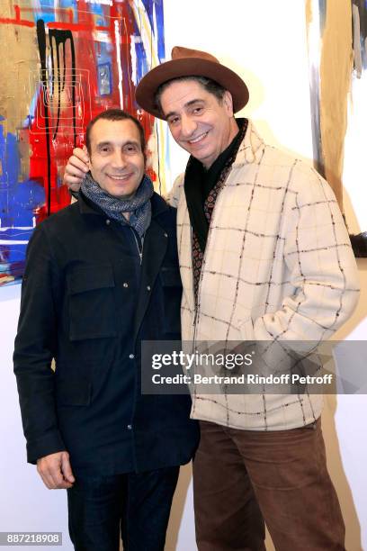 Actors Zinedine Soualem and Simon Abkarian attend painter Caroline Faindt Exhibition Opening at "L'Espace Reduit" on December 6, 2017 in Paris,...