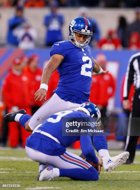 Aldrick Rosas of the New York Giants kicks a field goal in overtime to defeat the Kansas City Chiefs on November 19, 2017 at MetLife Stadium in East...