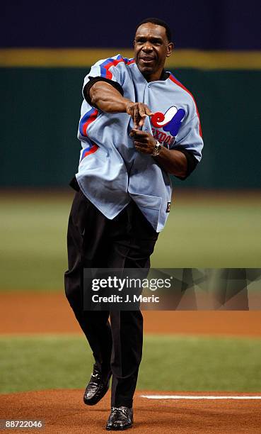 Former Major Leaguer Andre Dawson throws out the fist pitch of the game between the Tampa Bay Rays and the Florida Marlins at Tropicana Field on June...