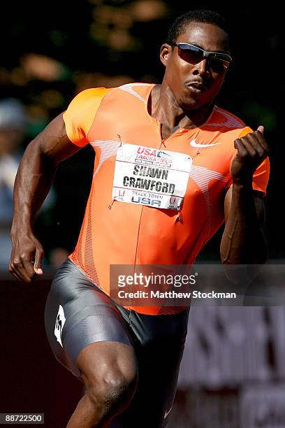 Shawn Crawford competes in the first round of the 200 meter event during the USA Outdoor Track & Field Championships at Hayward Field on June 27,...