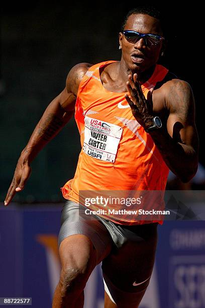 Xavier Carter competes in the first round of the 200 meter event during the USA Outdoor Track & Field Championships at Hayward Field on June 27, 2009...